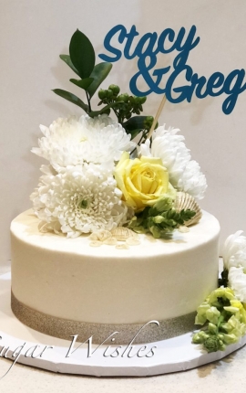 anniversary cake, buttercream cake, fresh flowers, yellow roses, white chocolate seashells, handmade sign