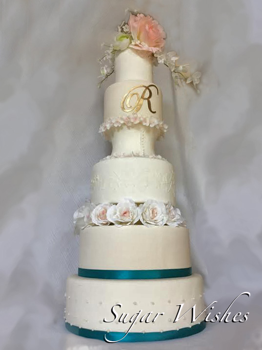 wedding cake, monogram, pink rose, white roses, stencil frosting
